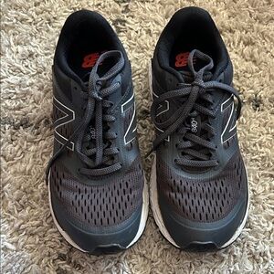 New Balance Woman’s Black and Gray Athletic Shoes